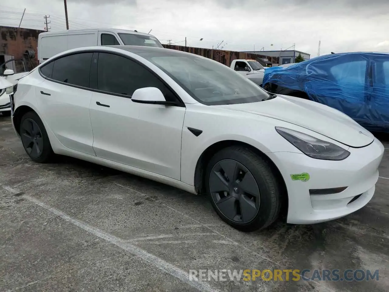 4 Photograph of a damaged car 5YJ3E1EA5PF570299 TESLA MODEL 3 2023