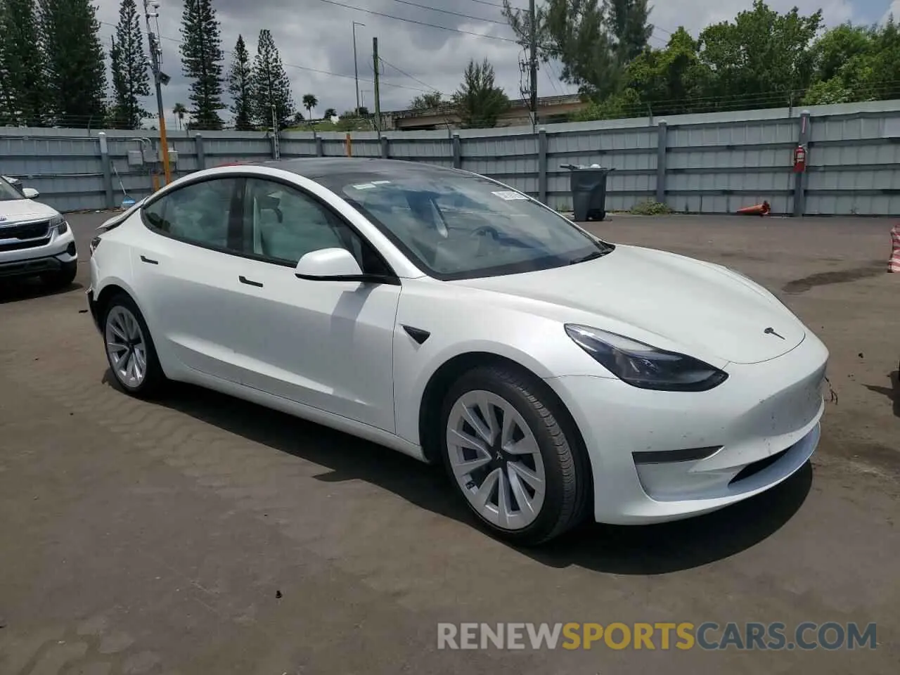 4 Photograph of a damaged car 5YJ3E1EA5PF580945 TESLA MODEL 3 2023