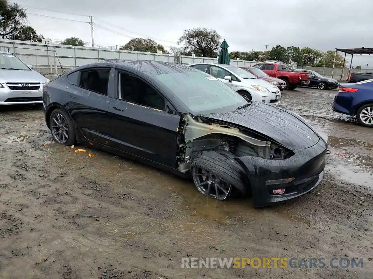 4 Photograph of a damaged car 5YJ3E1EA5PF590181 TESLA MODEL 3 2023