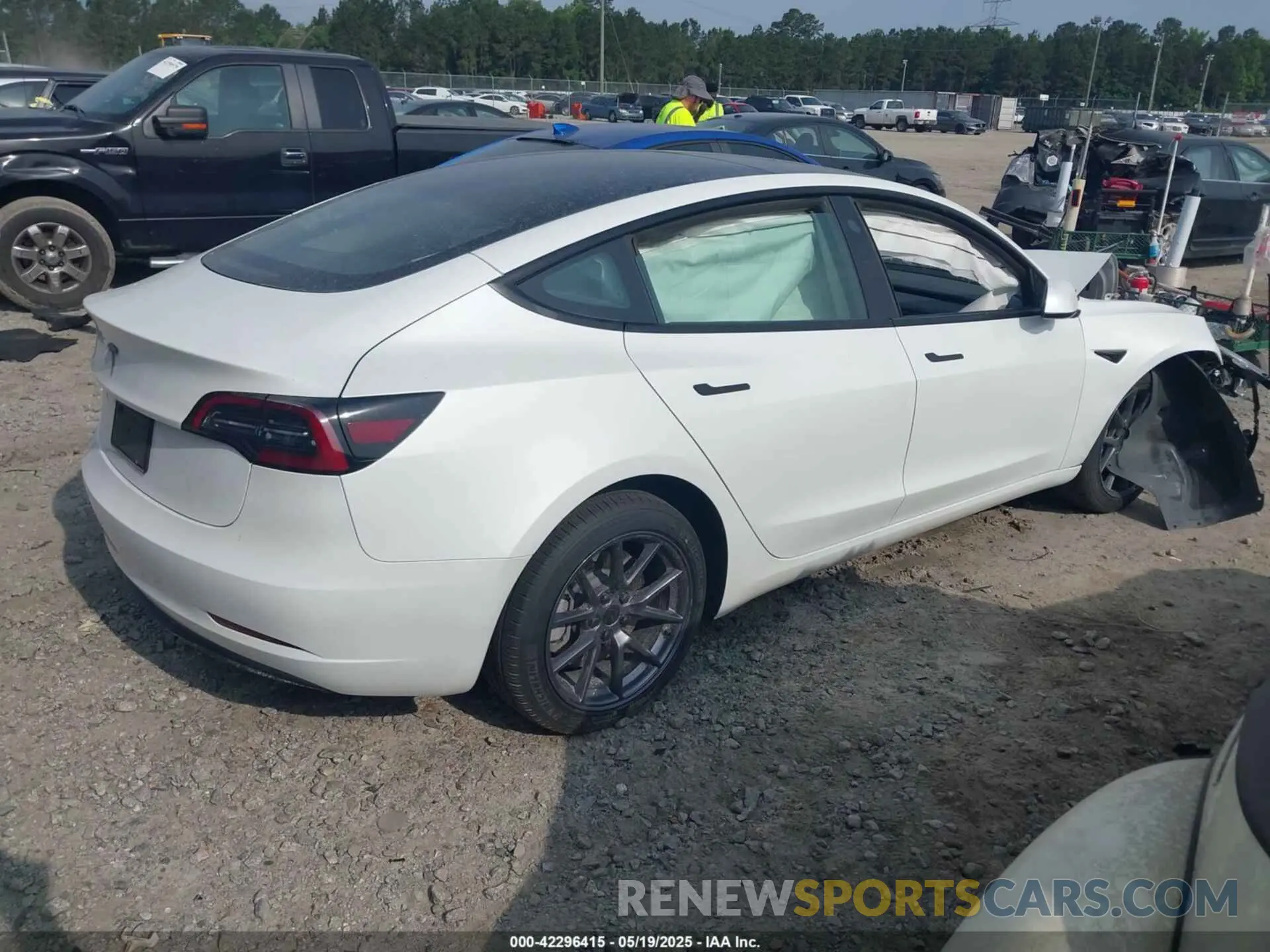 4 Photograph of a damaged car 5YJ3E1EA5PF599575 TESLA MODEL 3 2023