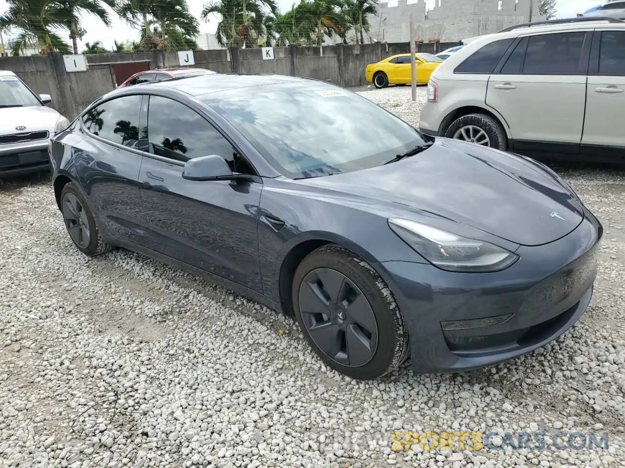 4 Photograph of a damaged car 5YJ3E1EA5PF646801 TESLA MODEL 3 2023