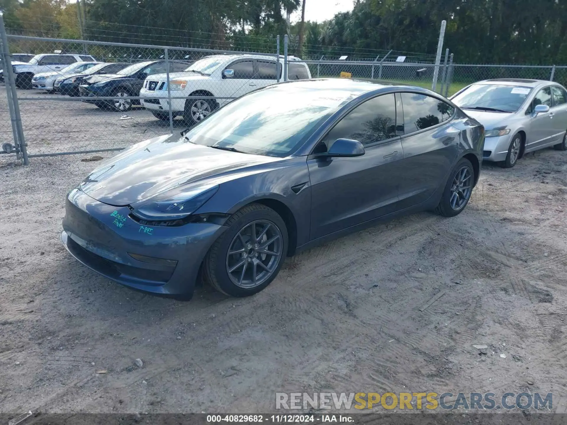 2 Photograph of a damaged car 5YJ3E1EA5PF648404 TESLA MODEL 3 2023