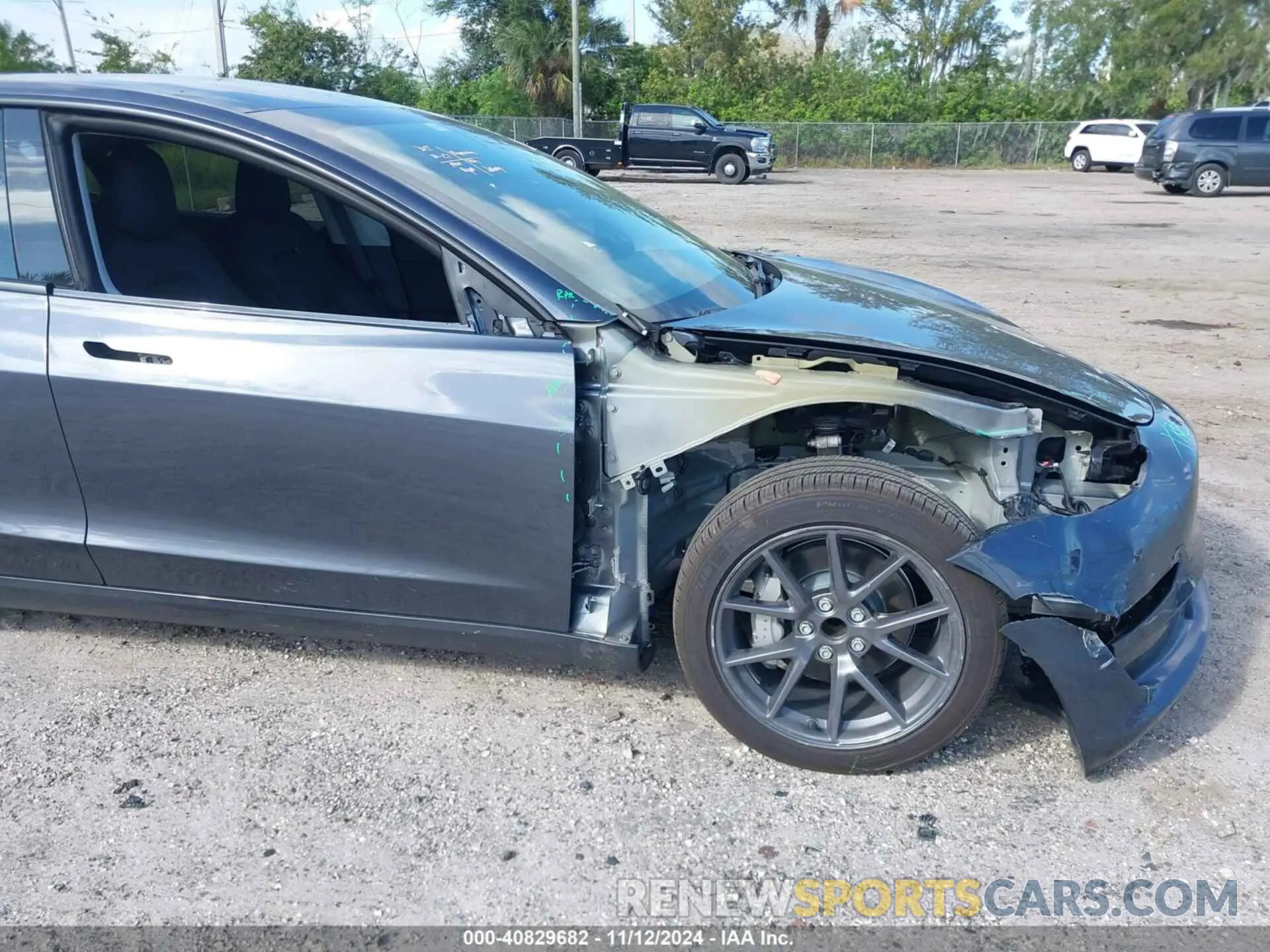 6 Photograph of a damaged car 5YJ3E1EA5PF648404 TESLA MODEL 3 2023
