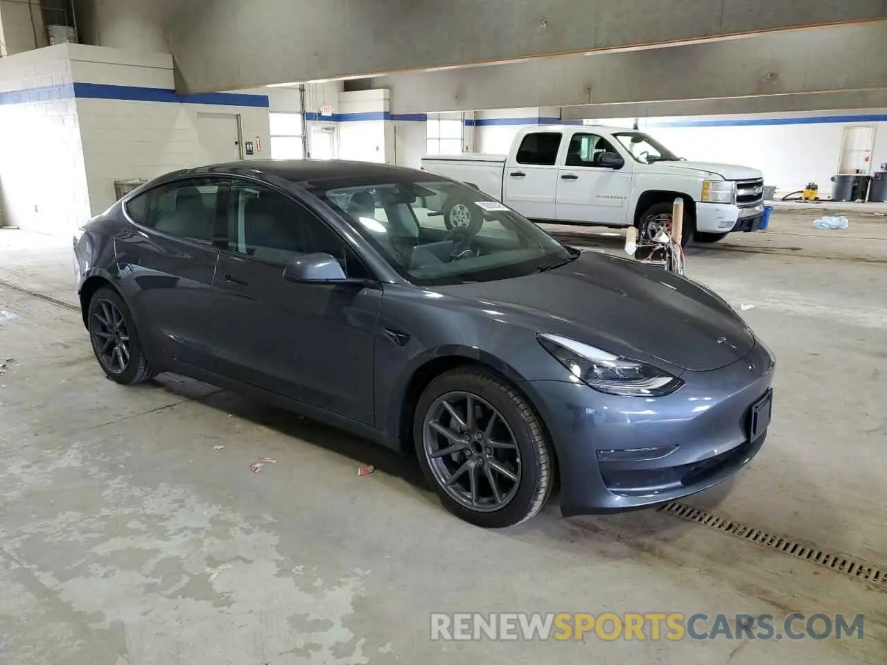 4 Photograph of a damaged car 5YJ3E1EA5PF658737 TESLA MODEL 3 2023