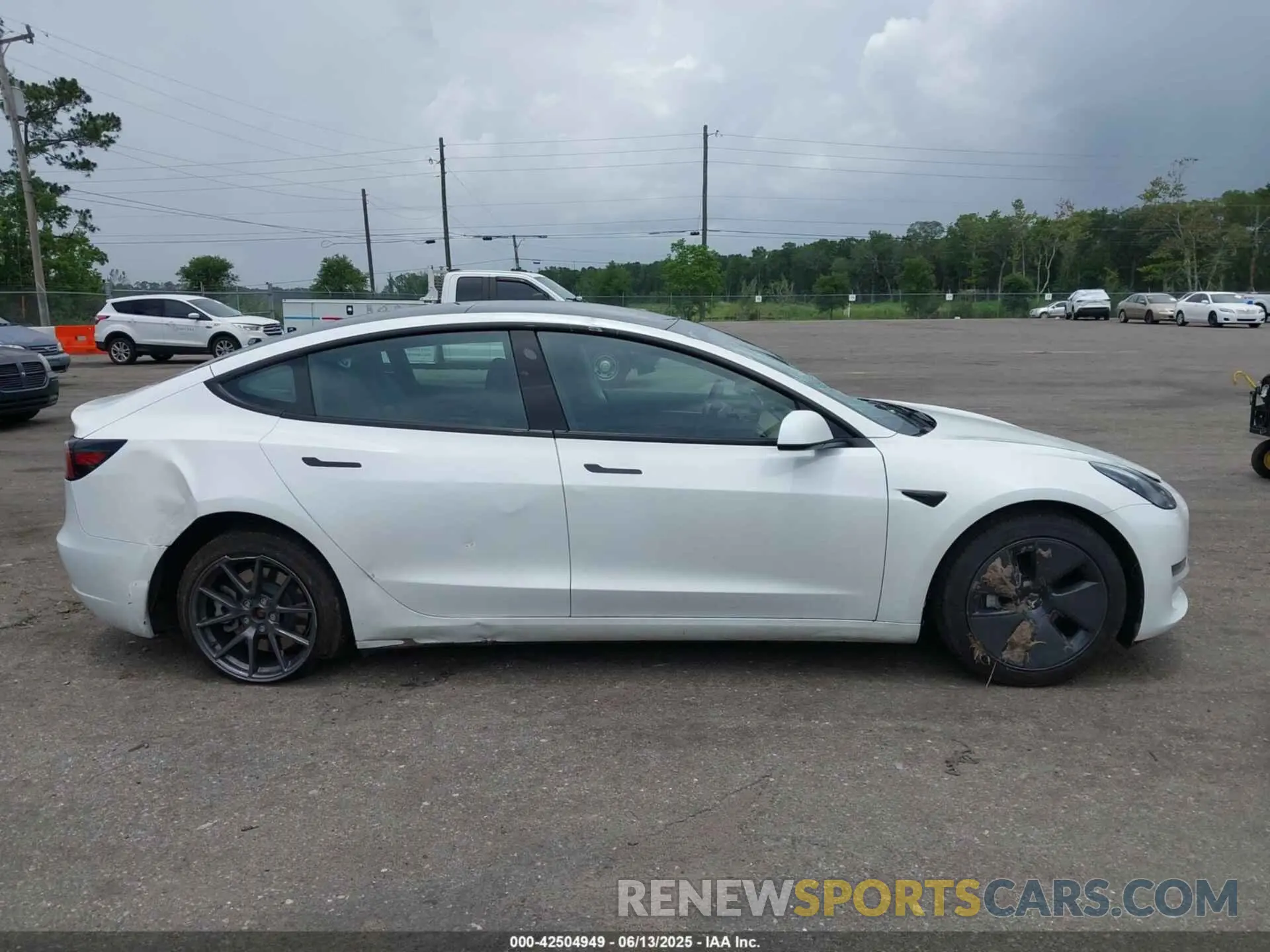 13 Photograph of a damaged car 5YJ3E1EA5PF663176 TESLA MODEL 3 2023