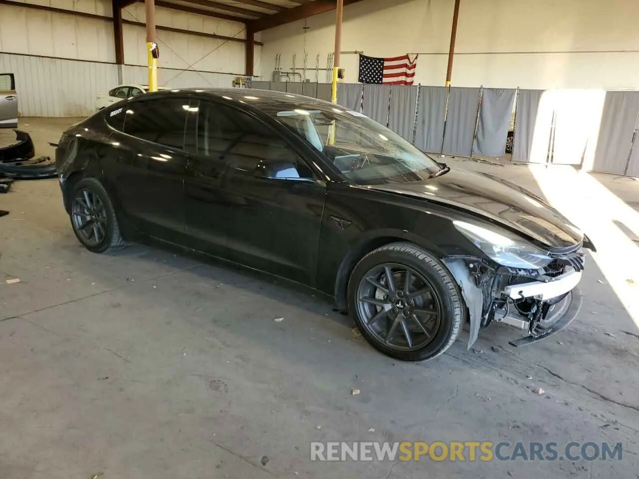 4 Photograph of a damaged car 5YJ3E1EA5PF663730 TESLA MODEL 3 2023