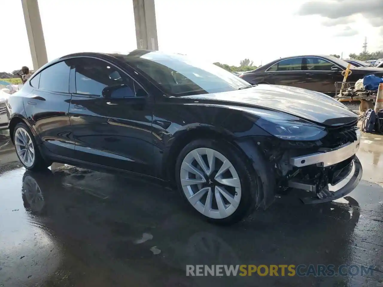 4 Photograph of a damaged car 5YJ3E1EA5PF670340 TESLA MODEL 3 2023