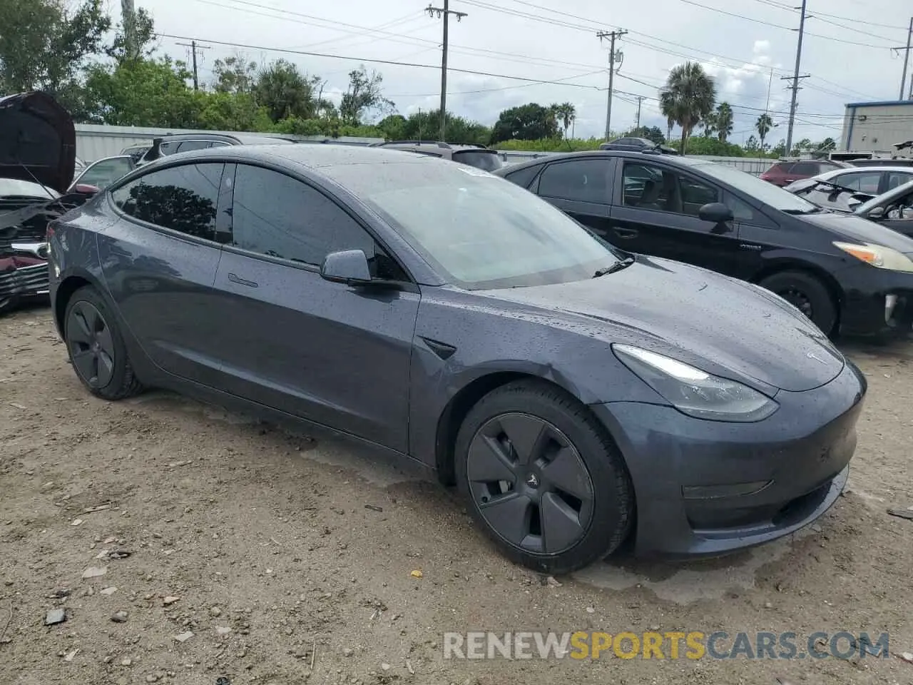 4 Photograph of a damaged car 5YJ3E1EA5PF674730 TESLA MODEL 3 2023