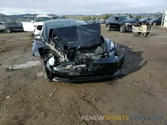 11 Photograph of a damaged car 5YJ3E1EA5PF695044 TESLA MODEL 3 2023
