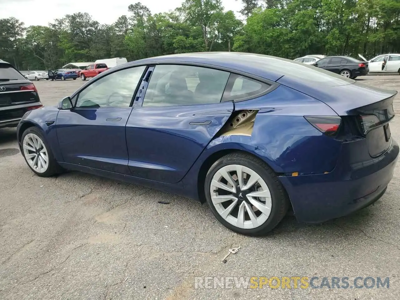 2 Photograph of a damaged car 5YJ3E1EA5PF695318 TESLA MODEL 3 2023