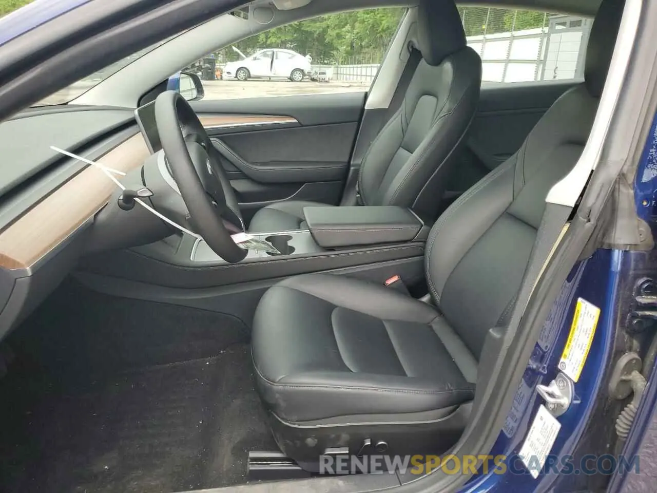 7 Photograph of a damaged car 5YJ3E1EA5PF695318 TESLA MODEL 3 2023