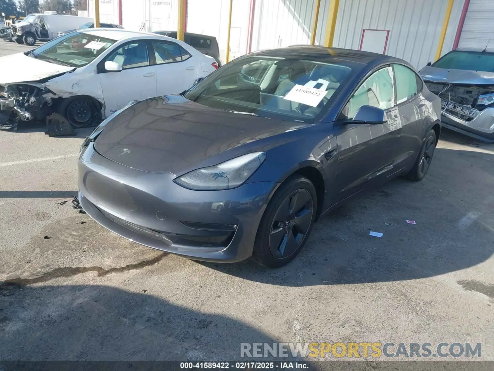 2 Photograph of a damaged car 5YJ3E1EA5PF697201 TESLA MODEL 3 2023