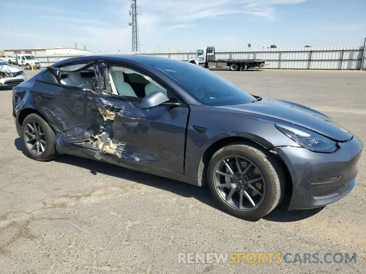 4 Photograph of a damaged car 5YJ3E1EA5PF712375 TESLA MODEL 3 2023