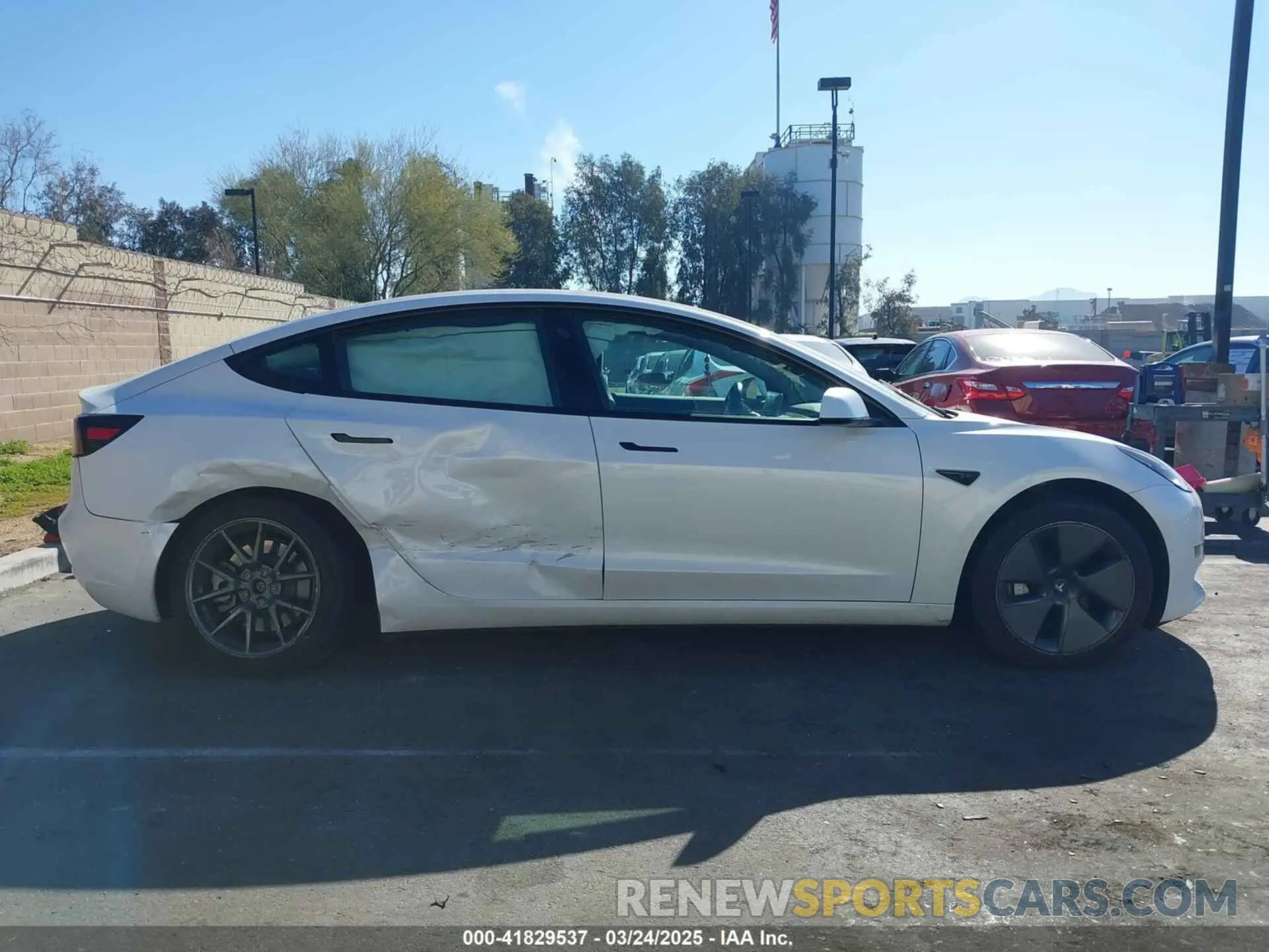 12 Photograph of a damaged car 5YJ3E1EA6PF411940 TESLA MODEL 3 2023