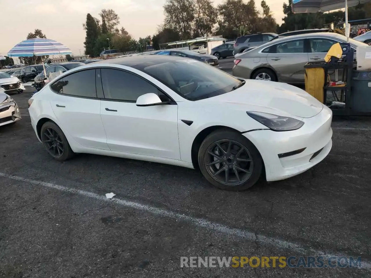 4 Photograph of a damaged car 5YJ3E1EA6PF413431 TESLA MODEL 3 2023
