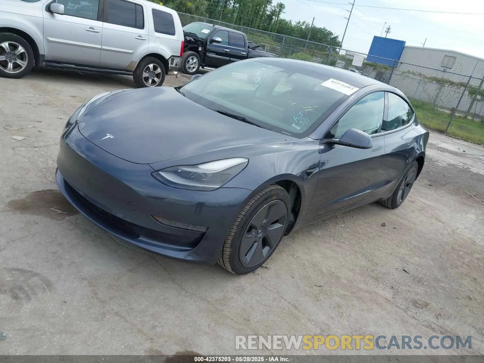 2 Photograph of a damaged car 5YJ3E1EA6PF435672 TESLA MODEL 3 2023