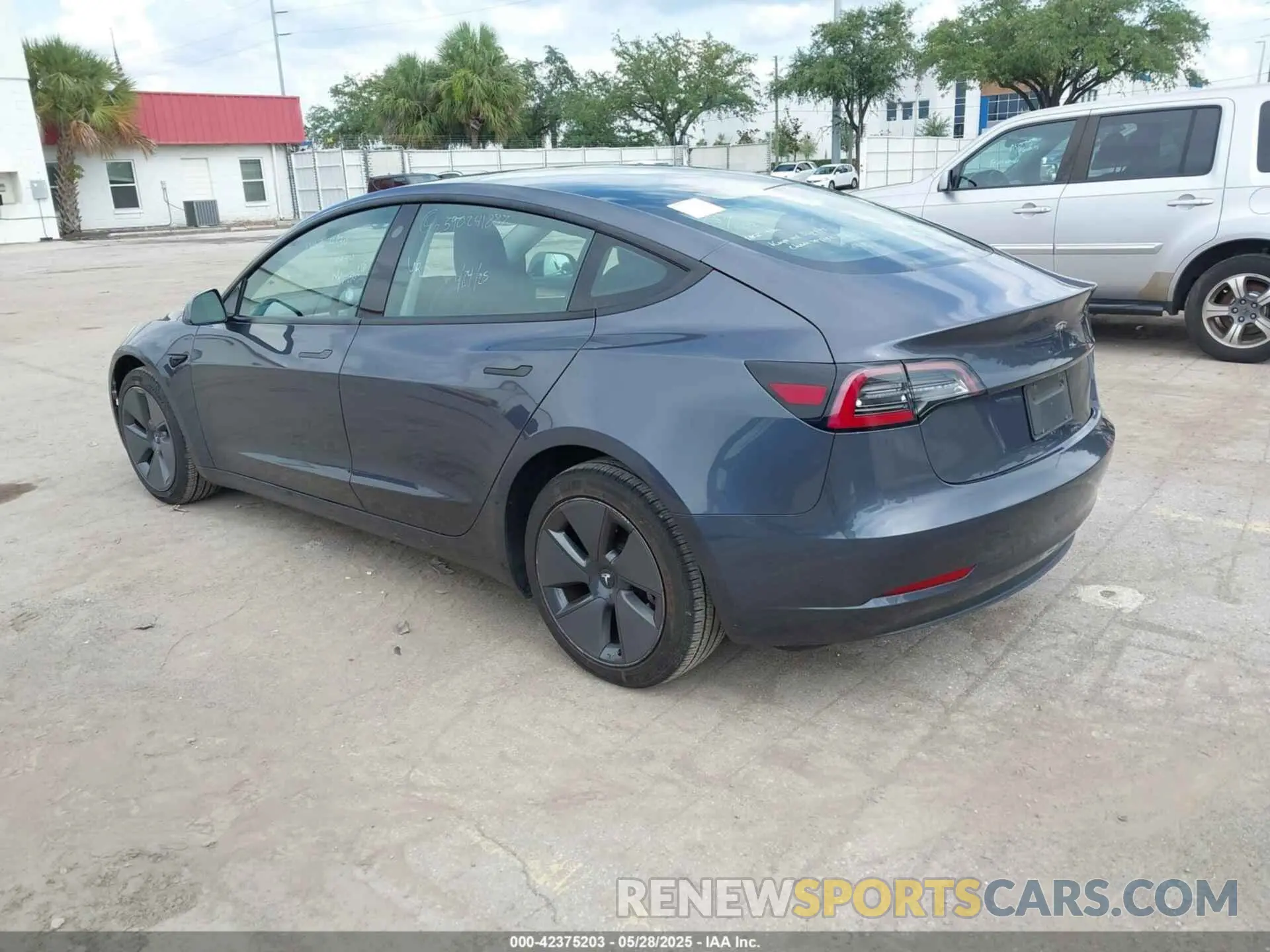 3 Photograph of a damaged car 5YJ3E1EA6PF435672 TESLA MODEL 3 2023