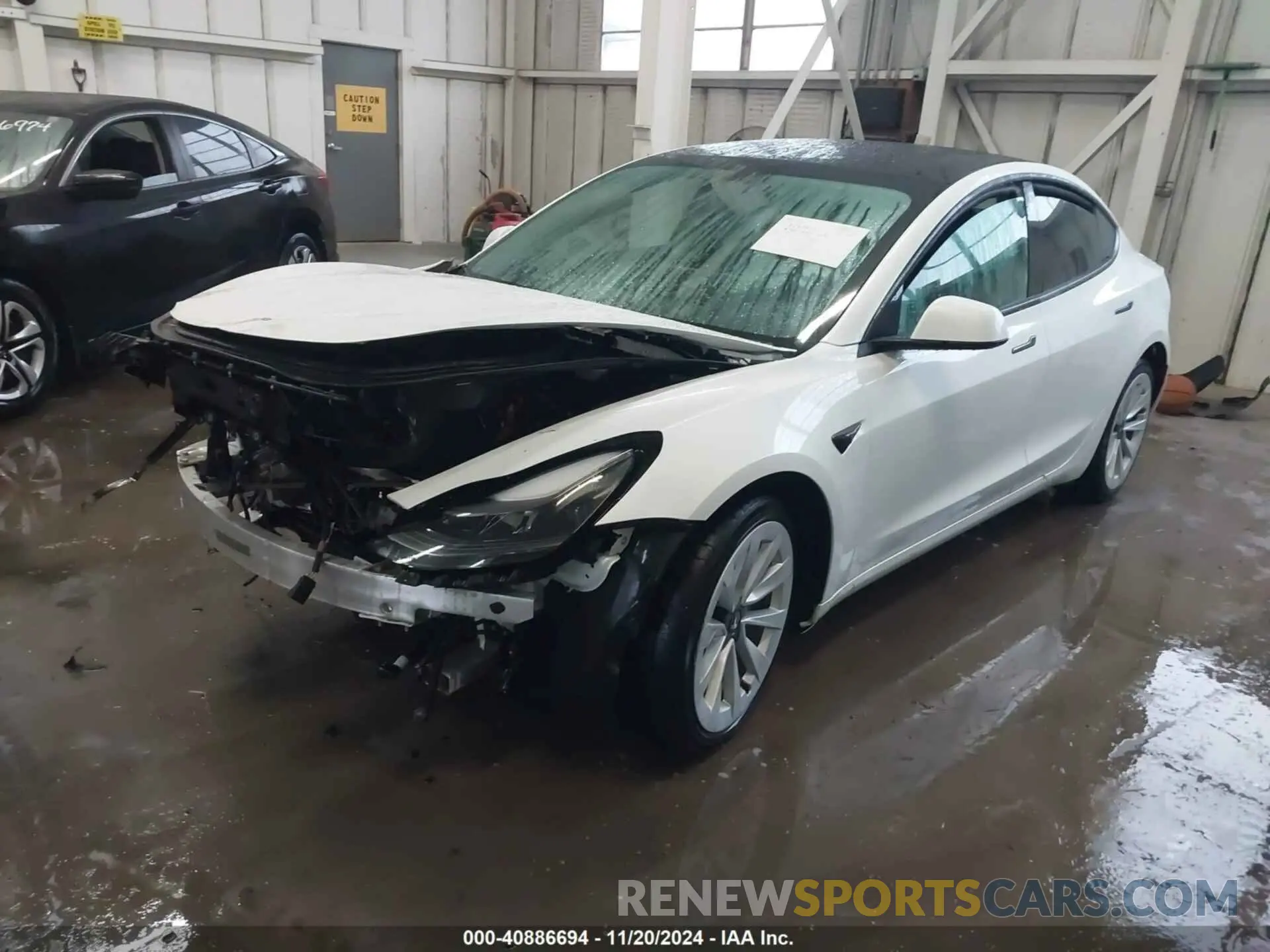 2 Photograph of a damaged car 5YJ3E1EA6PF435767 TESLA MODEL 3 2023