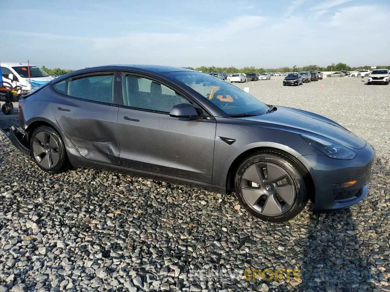 4 Photograph of a damaged car 5YJ3E1EA6PF436689 TESLA MODEL 3 2023