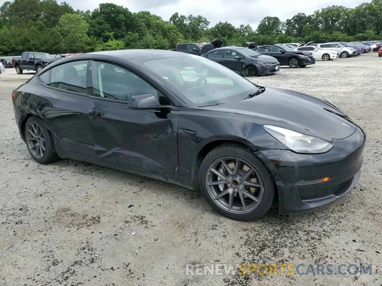 4 Photograph of a damaged car 5YJ3E1EA6PF437132 TESLA MODEL 3 2023