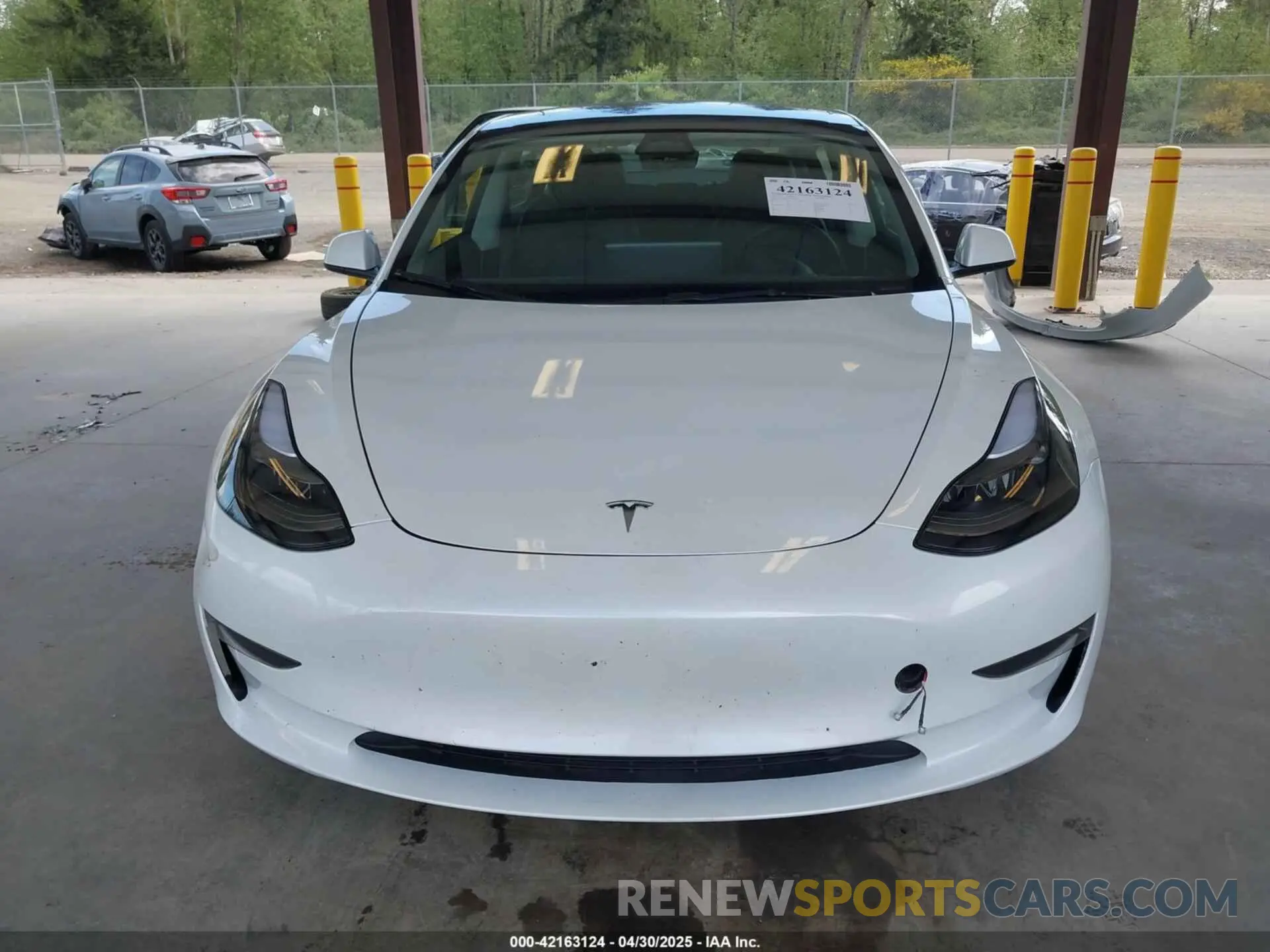 12 Photograph of a damaged car 5YJ3E1EA6PF472978 TESLA MODEL 3 2023