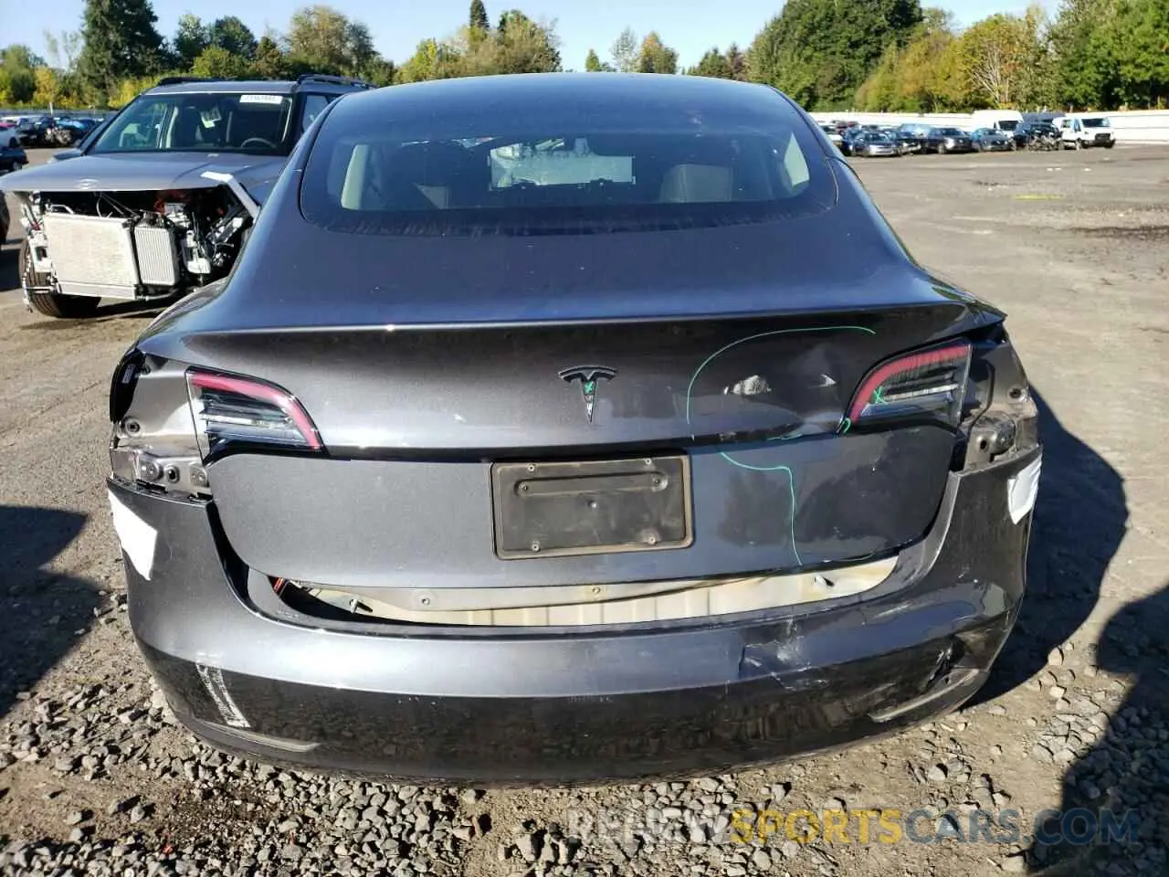 6 Photograph of a damaged car 5YJ3E1EA6PF473256 TESLA MODEL 3 2023