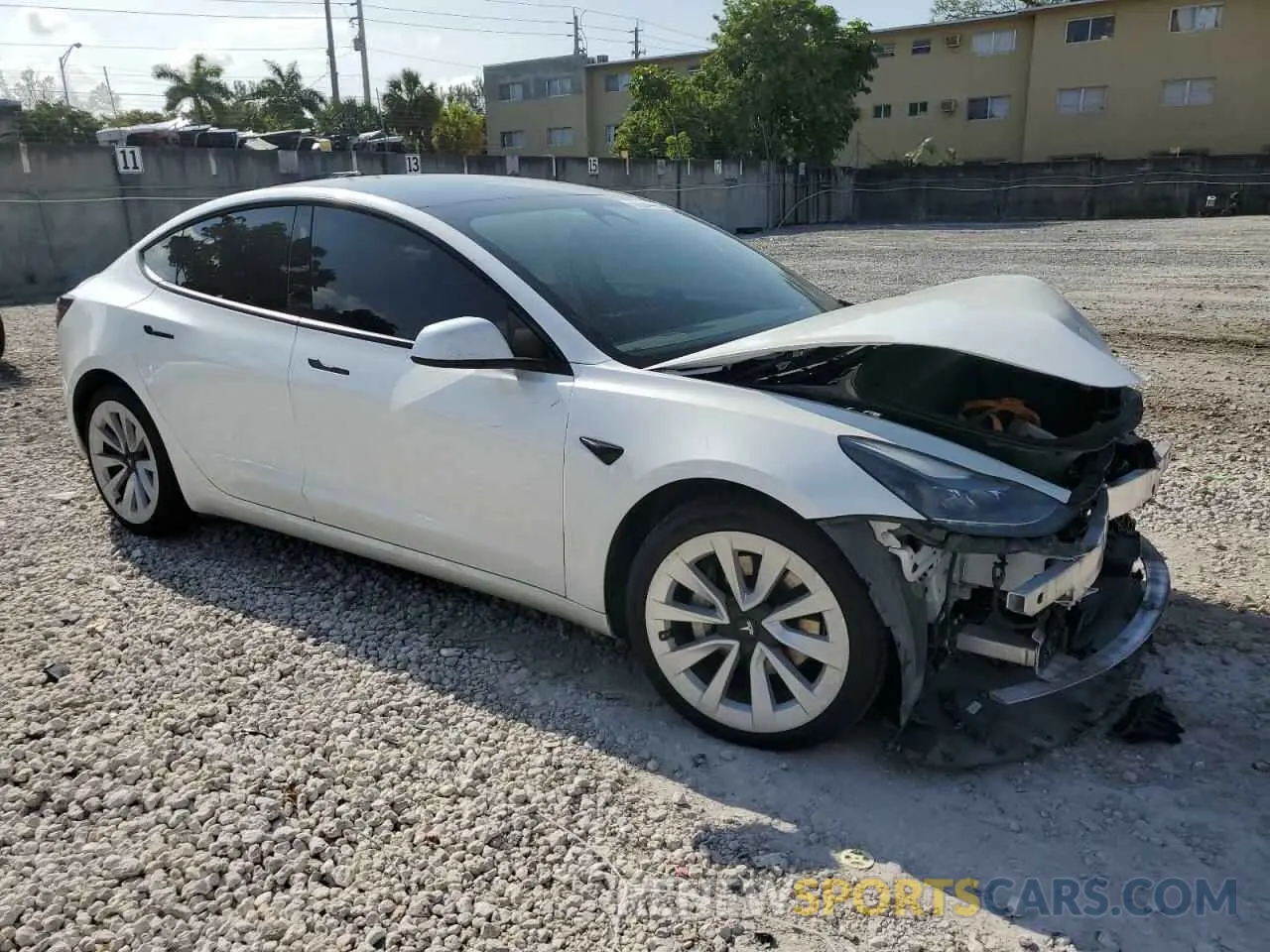 4 Photograph of a damaged car 5YJ3E1EA6PF510323 TESLA MODEL 3 2023