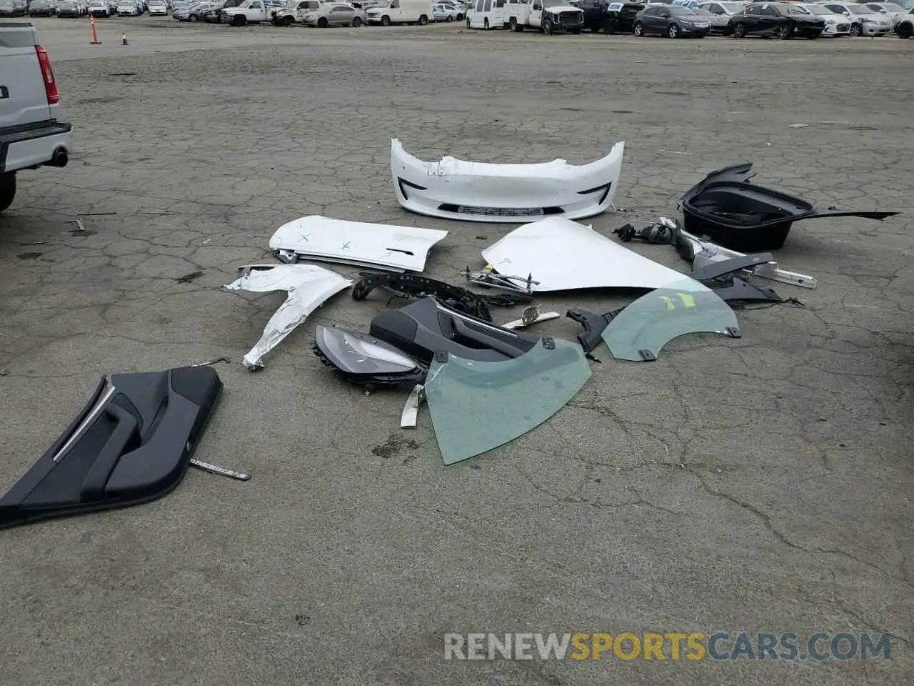 12 Photograph of a damaged car 5YJ3E1EA6PF553740 TESLA MODEL 3 2023
