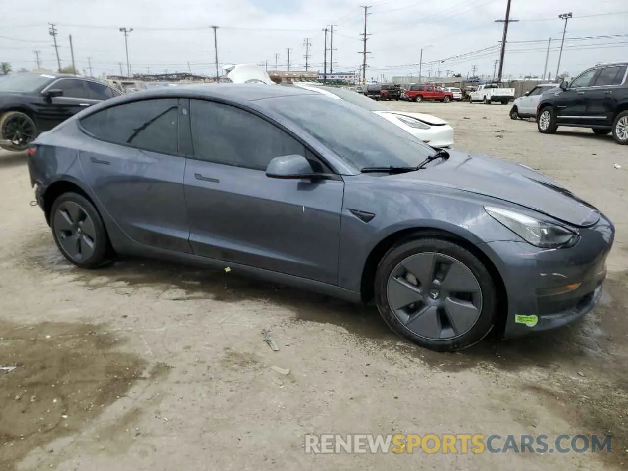 4 Photograph of a damaged car 5YJ3E1EA6PF573602 TESLA MODEL 3 2023
