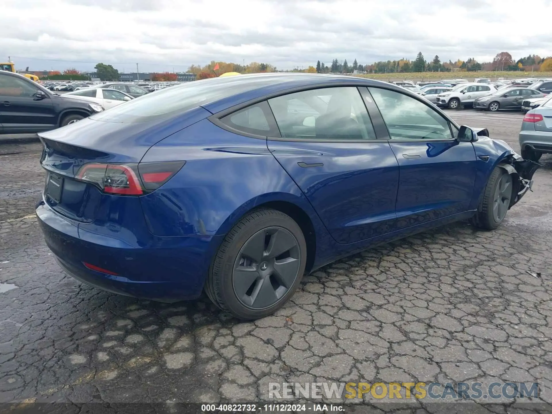4 Photograph of a damaged car 5YJ3E1EA6PF590450 TESLA MODEL 3 2023