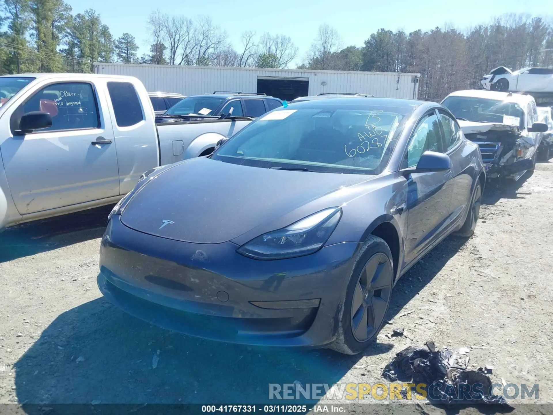 2 Photograph of a damaged car 5YJ3E1EA6PF602872 TESLA MODEL 3 2023