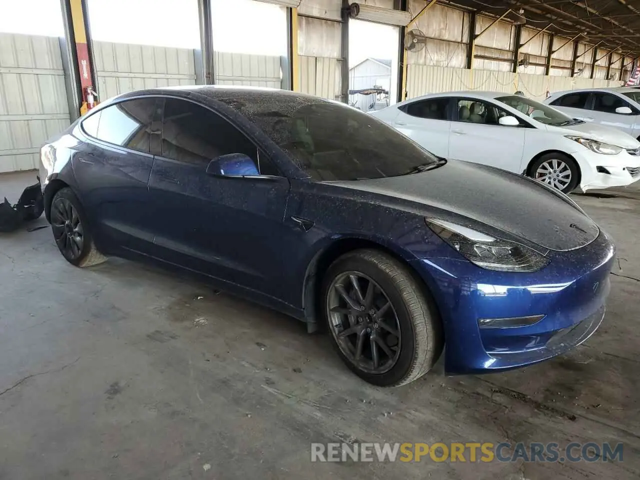 4 Photograph of a damaged car 5YJ3E1EA6PF615704 TESLA MODEL 3 2023