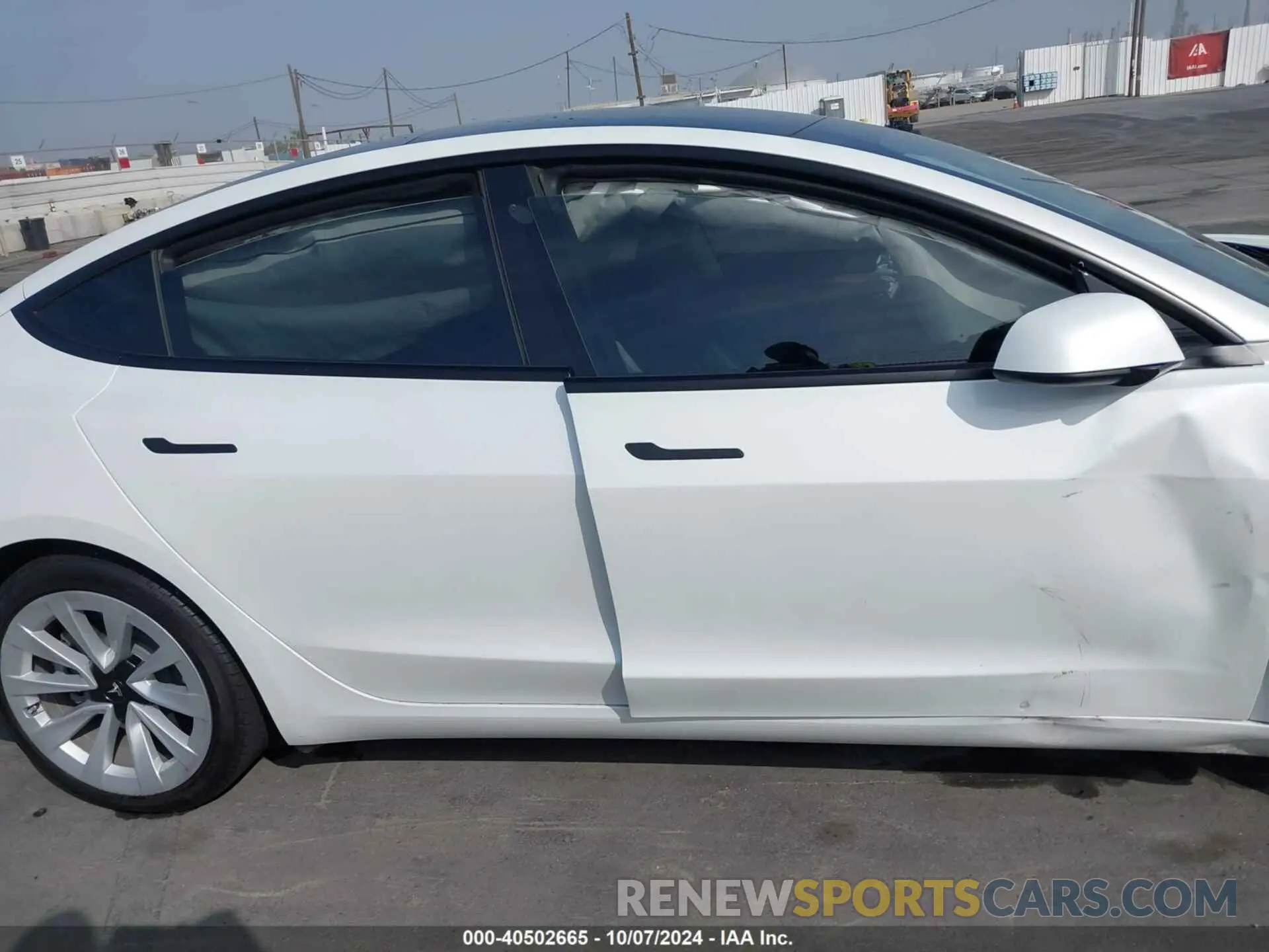 12 Photograph of a damaged car 5YJ3E1EA6PF616299 TESLA MODEL 3 2023