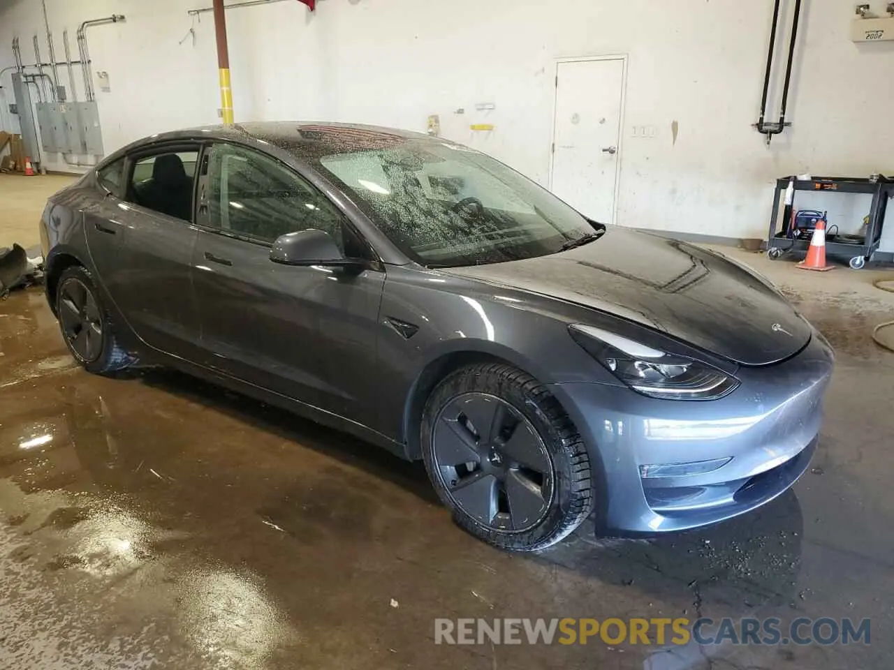 4 Photograph of a damaged car 5YJ3E1EA6PF651117 TESLA MODEL 3 2023
