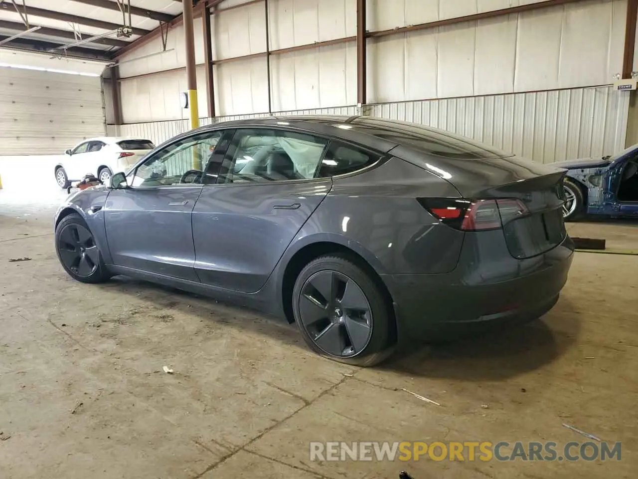 2 Photograph of a damaged car 5YJ3E1EA6PF656107 TESLA MODEL 3 2023