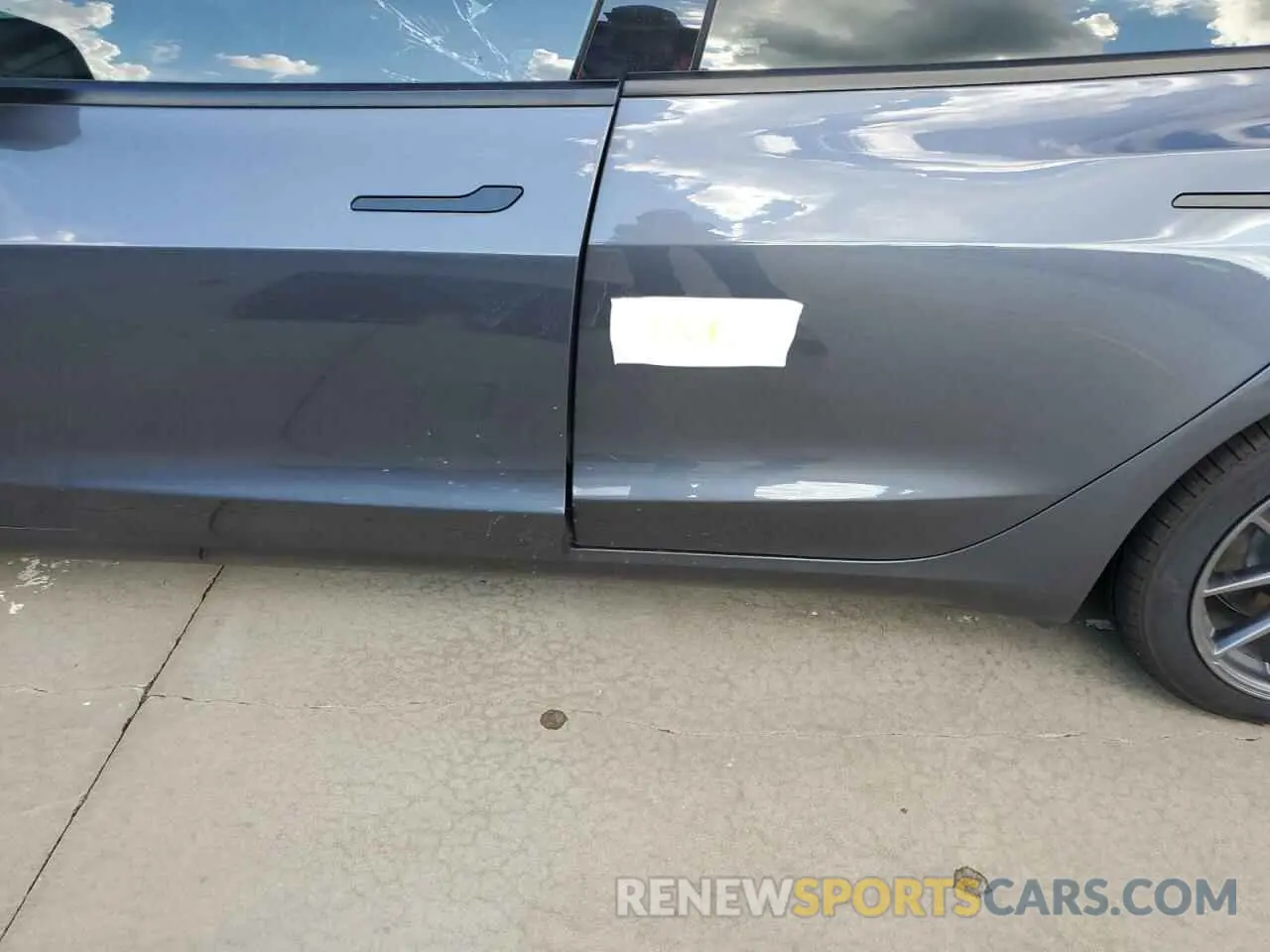 12 Photograph of a damaged car 5YJ3E1EA6PF682531 TESLA MODEL 3 2023
