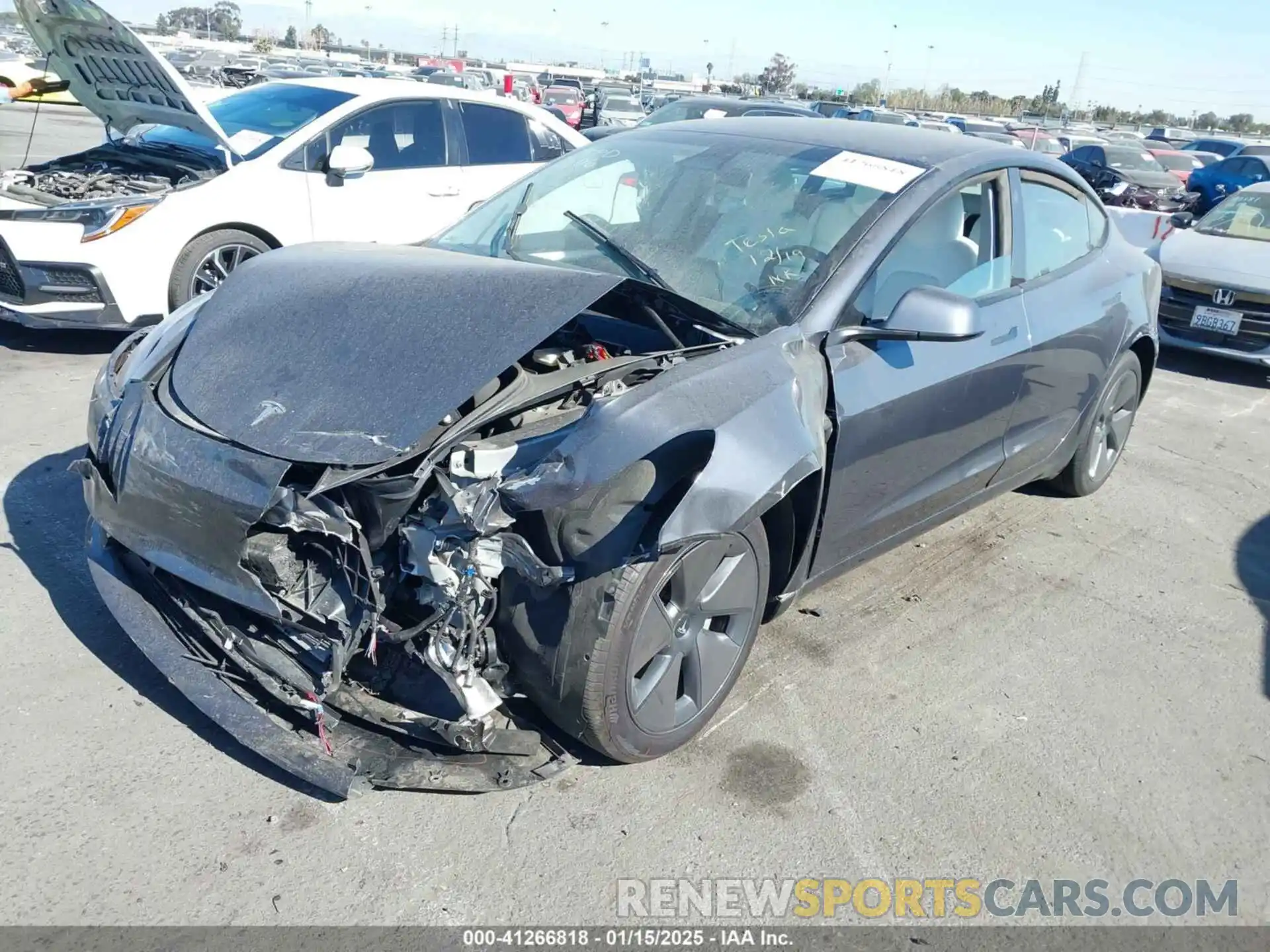 2 Photograph of a damaged car 5YJ3E1EA6PF698583 TESLA MODEL 3 2023