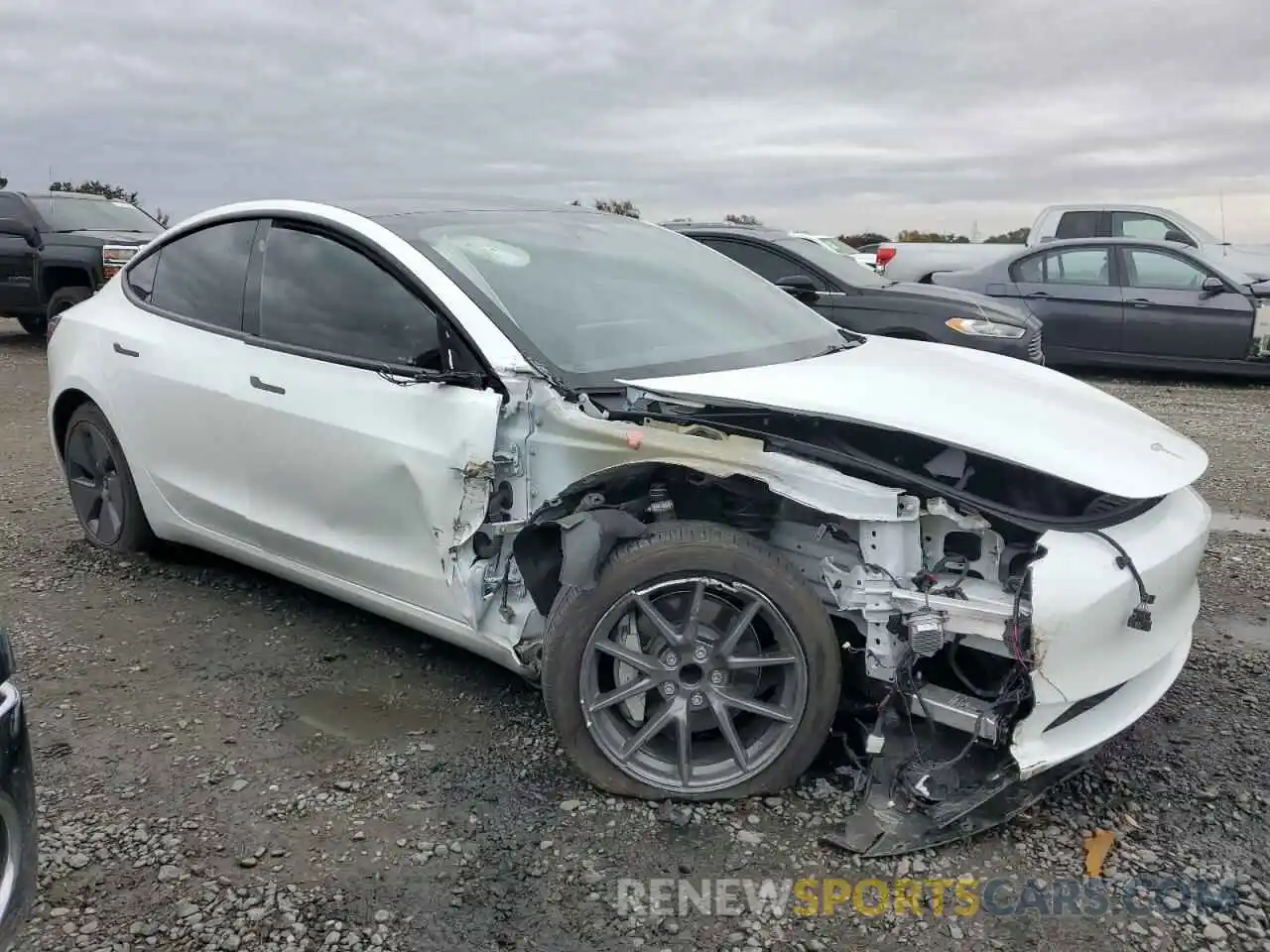 4 Photograph of a damaged car 5YJ3E1EA6PF709176 TESLA MODEL 3 2023