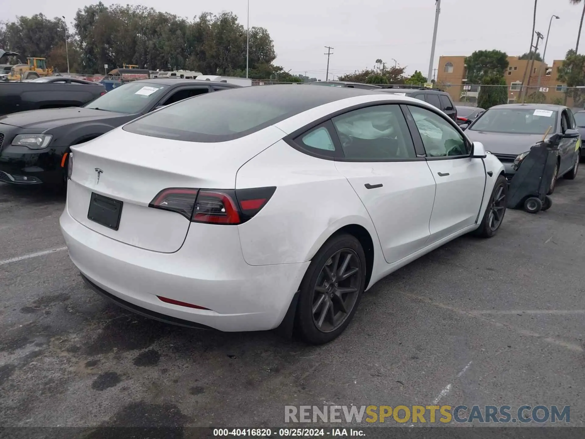 4 Photograph of a damaged car 5YJ3E1EA6PF713969 TESLA MODEL 3 2023