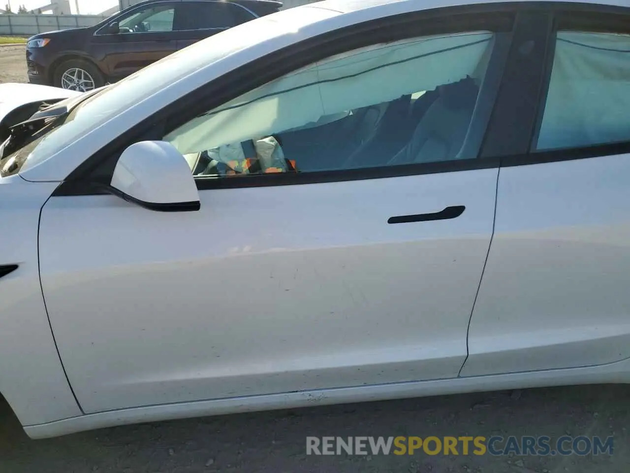 7 Photograph of a damaged car 5YJ3E1EA7PF393996 TESLA MODEL 3 2023