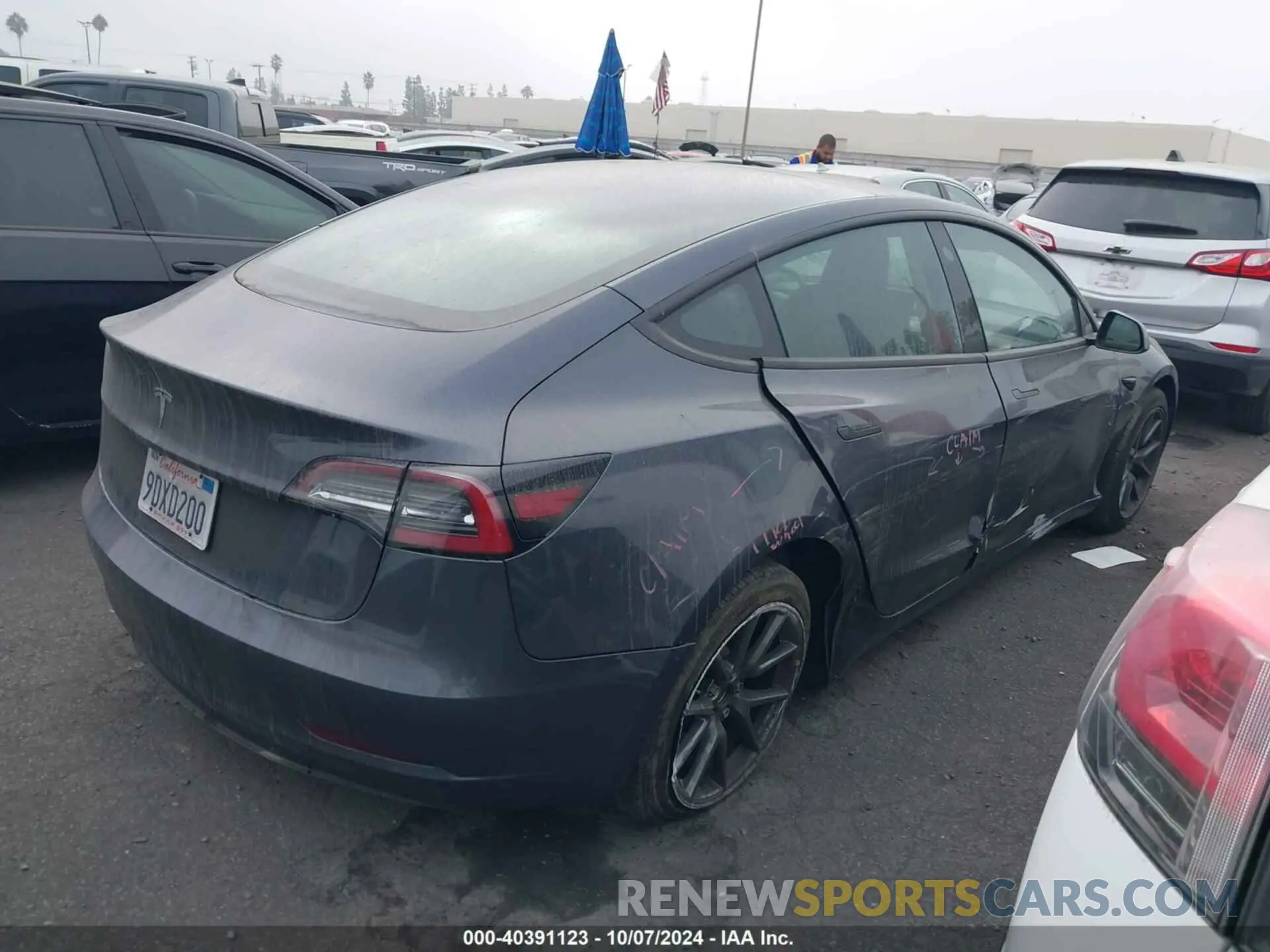 4 Photograph of a damaged car 5YJ3E1EA7PF410330 TESLA MODEL 3 2023