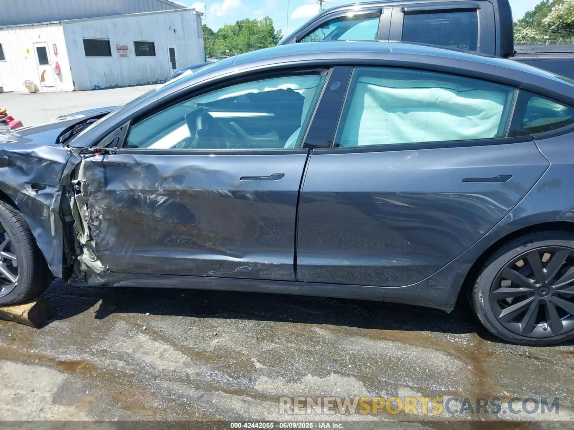 14 Photograph of a damaged car 5YJ3E1EA7PF413311 TESLA MODEL 3 2023