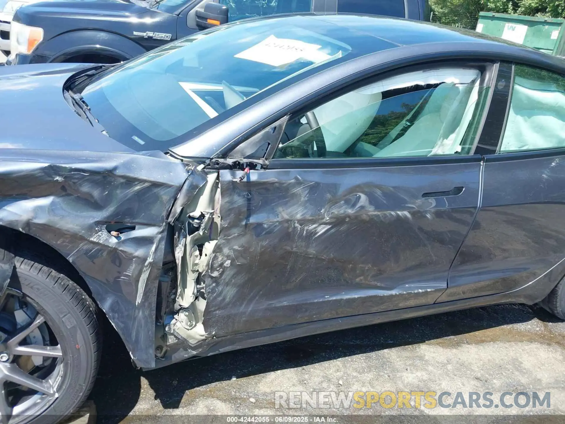 19 Photograph of a damaged car 5YJ3E1EA7PF413311 TESLA MODEL 3 2023