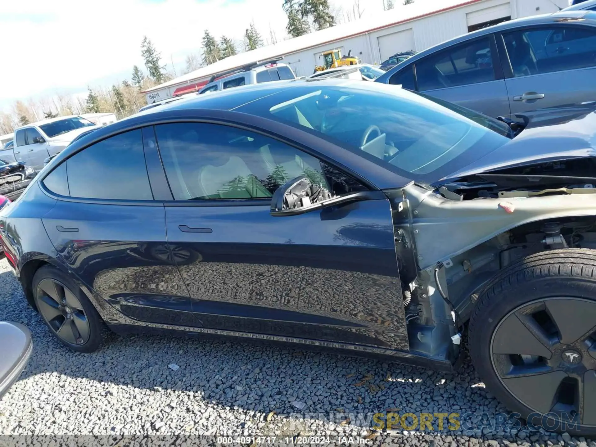 14 Photograph of a damaged car 5YJ3E1EA7PF418279 TESLA MODEL 3 2023