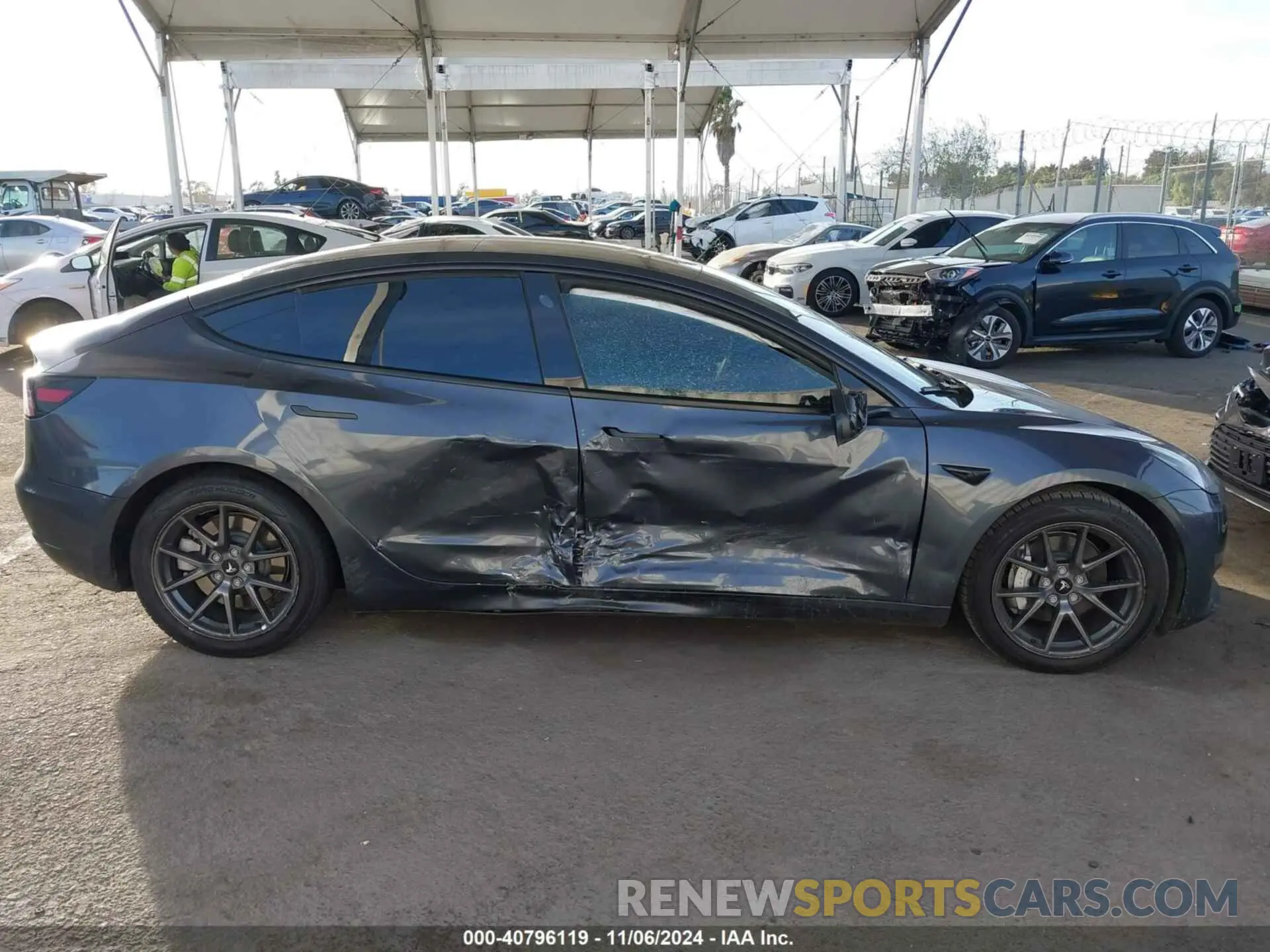 12 Photograph of a damaged car 5YJ3E1EA7PF431744 TESLA MODEL 3 2023