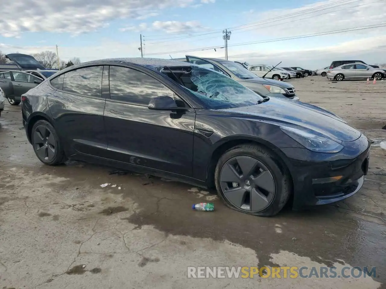 4 Photograph of a damaged car 5YJ3E1EA7PF447135 TESLA MODEL 3 2023