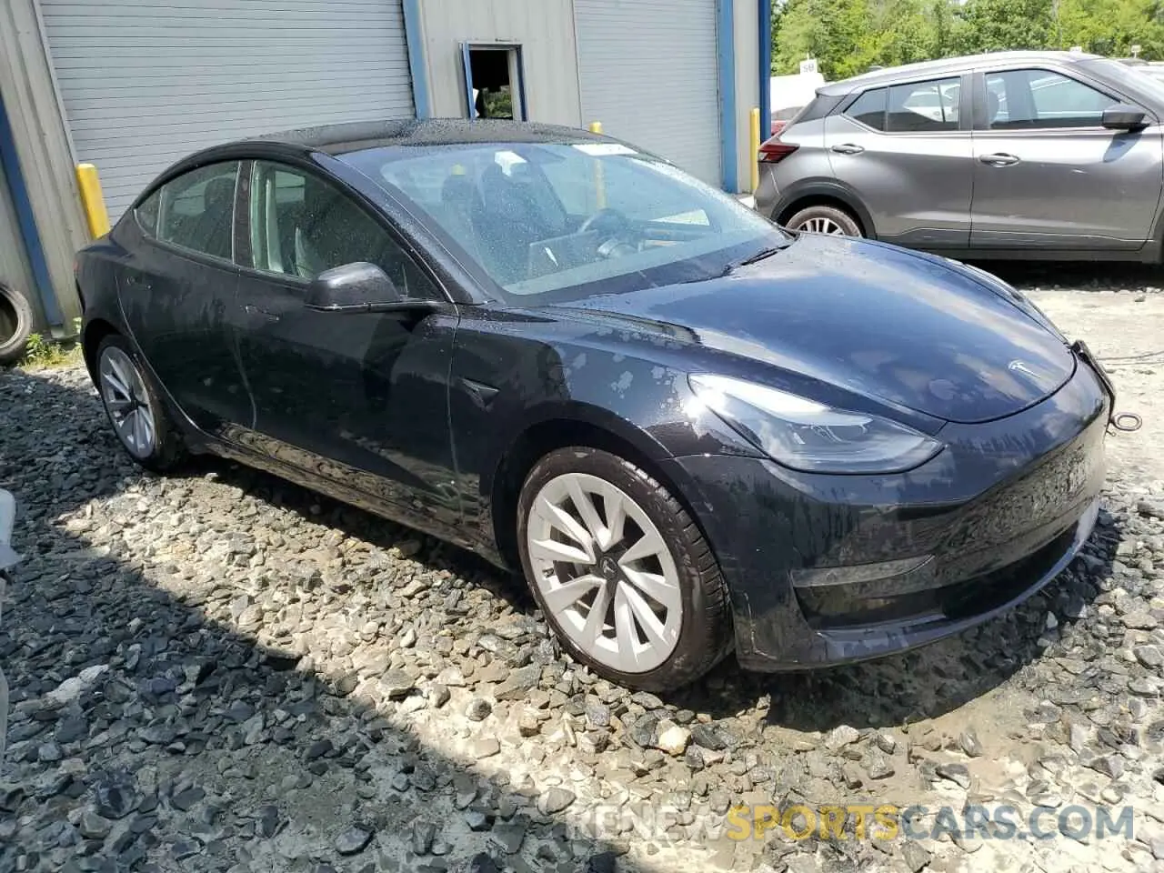 4 Photograph of a damaged car 5YJ3E1EA7PF449693 TESLA MODEL 3 2023