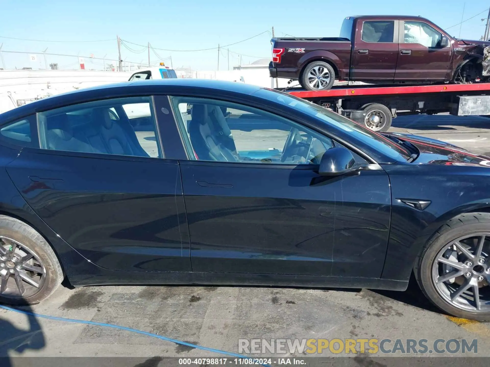 14 Photograph of a damaged car 5YJ3E1EA7PF456899 TESLA MODEL 3 2023