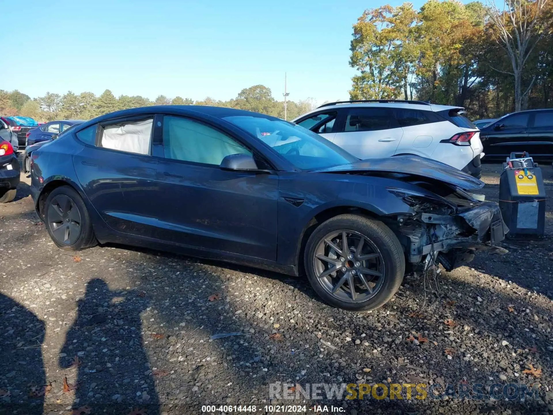 12 Photograph of a damaged car 5YJ3E1EA7PF458006 TESLA MODEL 3 2023
