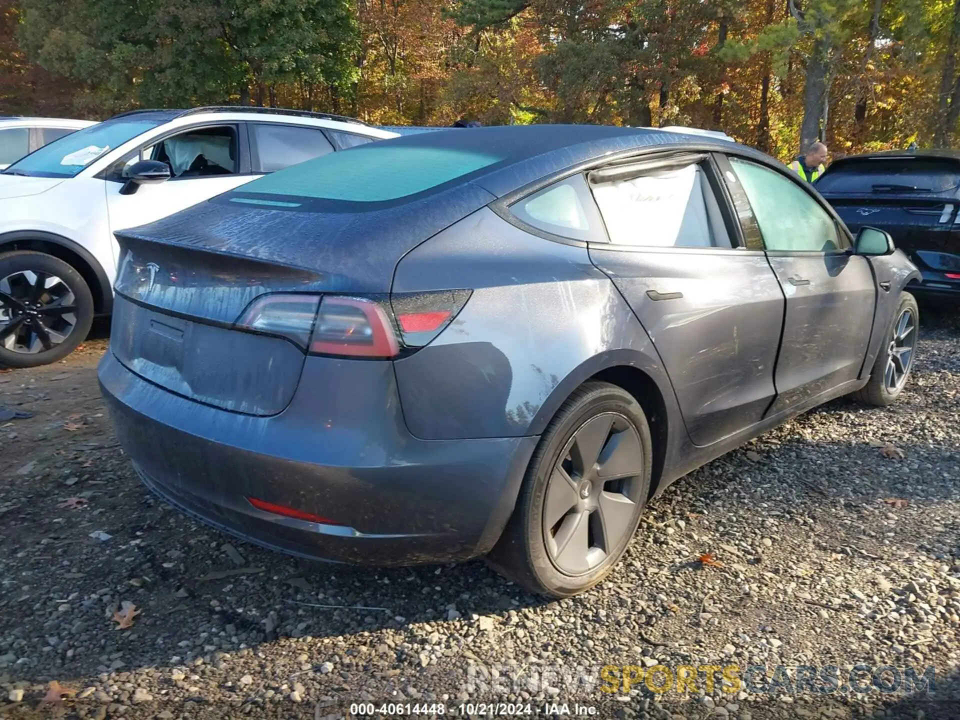 4 Photograph of a damaged car 5YJ3E1EA7PF458006 TESLA MODEL 3 2023